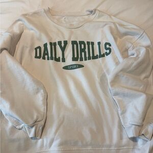 Daily Drills White Sweatshirt with Green Logo